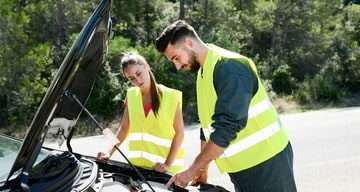 Mechanic fixing car